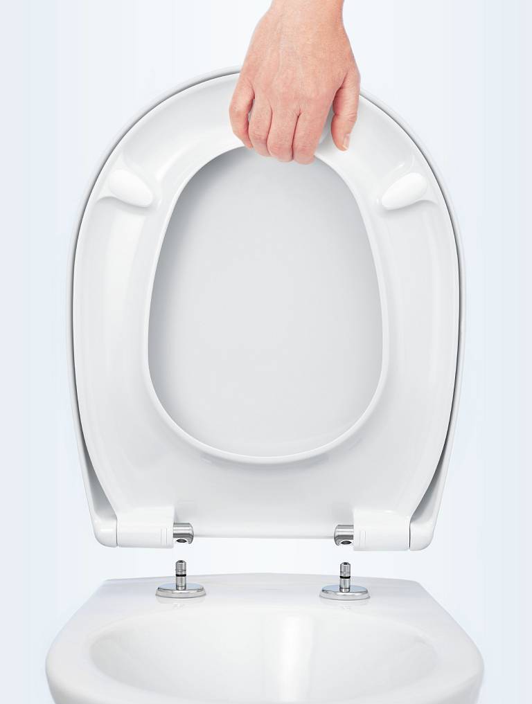 Removable toilet seat from the house of Hamberger Sanitary for easy and effortless hygiene.