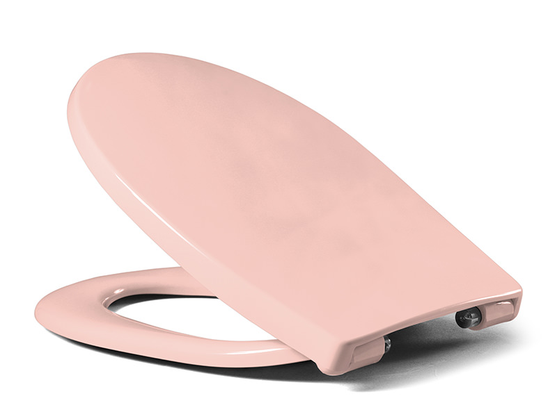 Half-open toilet seat made of plastic in light pink.